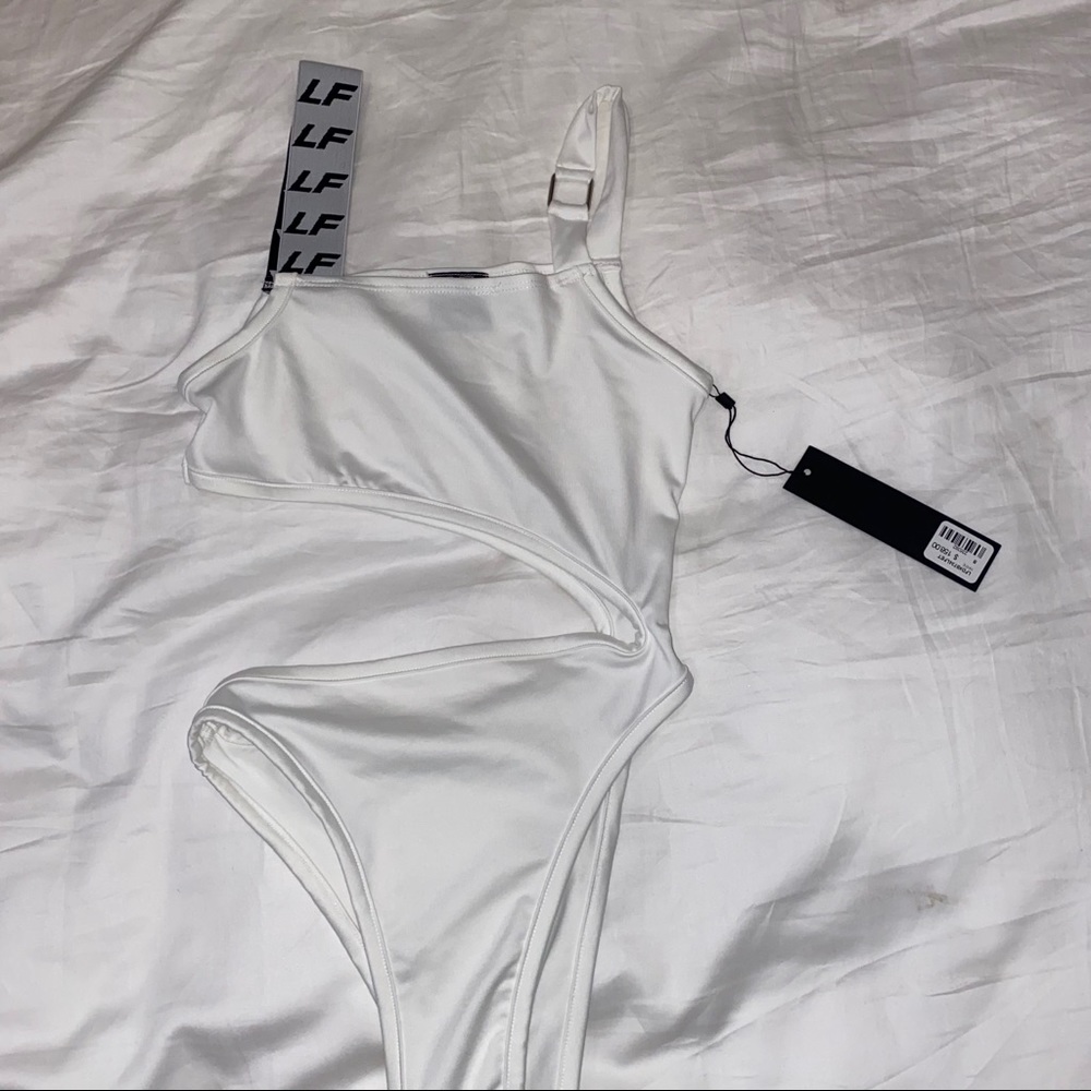 LF WHITE CUT OUT BODY SUIT NWT